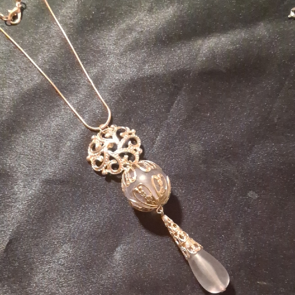 Elegant Gold and Silver Pendant Necklace